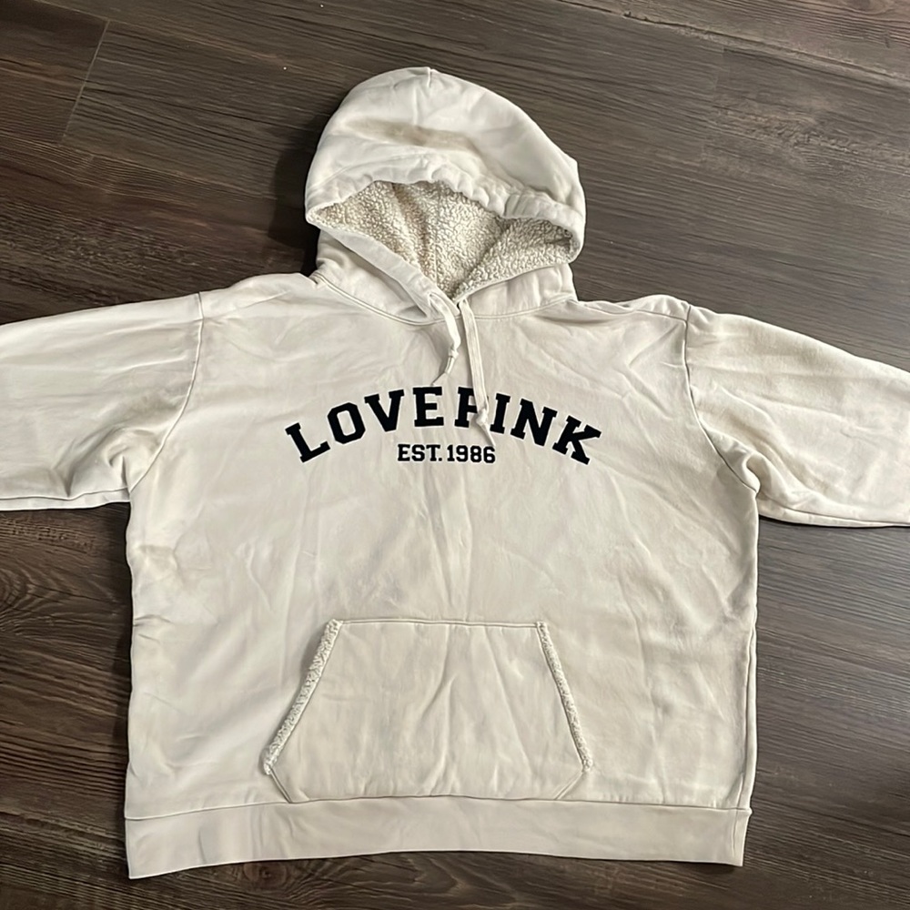 Pink Hoodie with Sherpa Lined hood and front pocket.